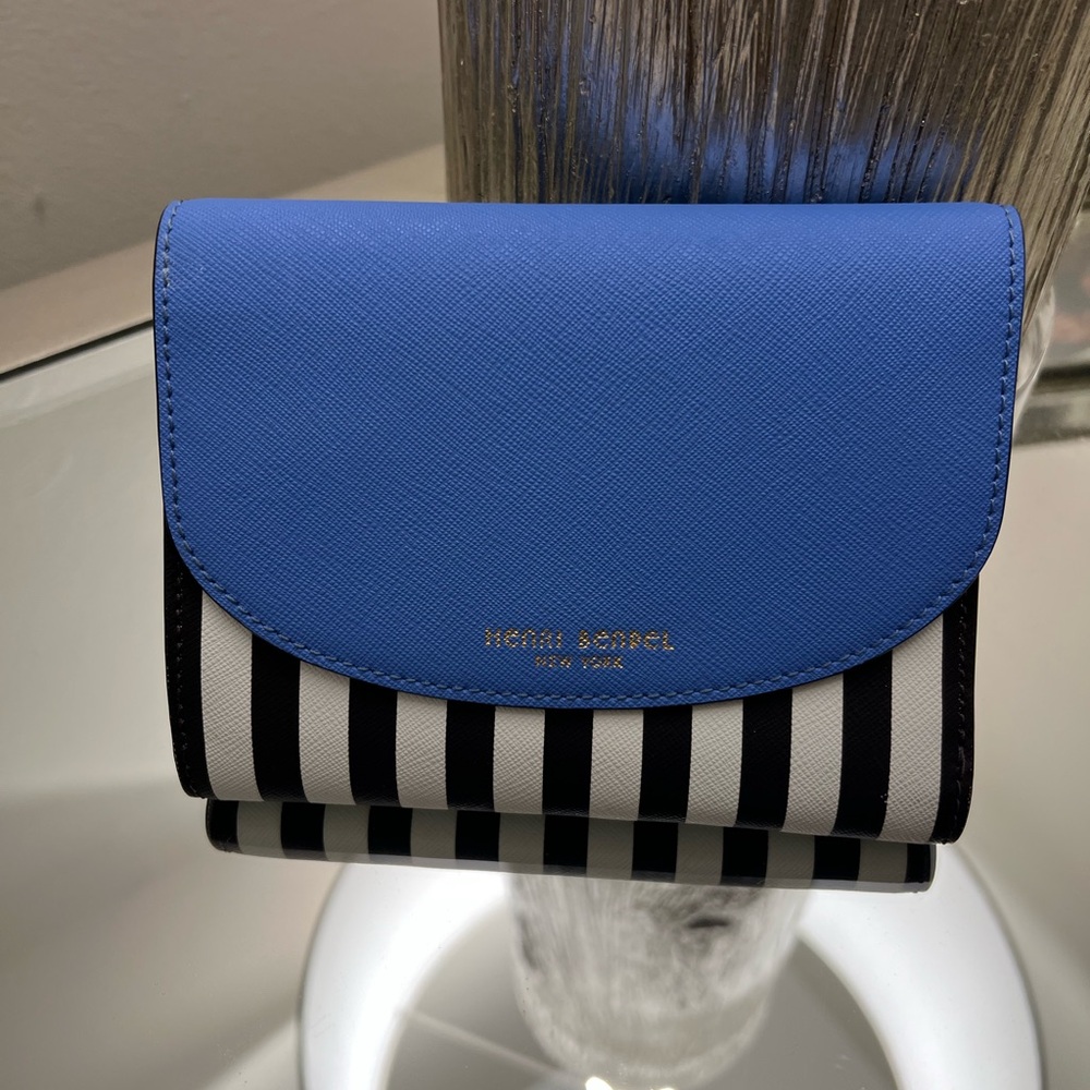NWOT Henri Bendel Wallet in blue with black and white stripes.